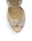 Vista de material sintético en zapatilla oro para mujer con tacón alto de 11cm y pulsera ajustable al tobillo