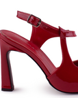 vista trasera del tacón medio 10 cm en zapatillas rojas para dama con correa ajustable destalonadas