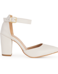 vista lateral de zapatillas beige para dama con correa ajustable terminación en punta y tacón medio 8cm