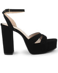 Vista lateral de zapatilla negra para mujer con tacón bloque alto de 12cm y pulsera ajustable al tobillo