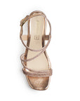 Vista superior de zapatilla oro rosa con punta cuadrada de diseño descubierto tiras forradas de pedrería y pulsera ajustable