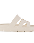 Vista lateral de la sandalia beige cómoda con plataforma baja 4cm y punta abierta para dama
