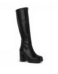 Vista diagonal de bota negra con cremallera plataforma y tacón medio 9 cm para dama
