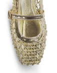 Vista de material sintético en flats tipo balerina para mujer con pulsera en empeine de piso tejido en color dorado