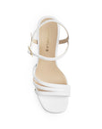 Vista superior de zapatilla para mujer con tiras cruzadas y hebilla ajustable en color blanco