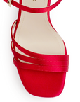 Vista de material shantung en zapatilla roja para mujer con tiras cruzadas y tacón alto de 11cm