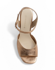 Vista superior de zapatilla para dama oro rosa con punta abierta pulsera ajustable al tobillo y plataforma tacón alto 12cm