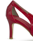 vista trasera del tacón medio 8 cm en las zapatillas rojas para dama con moño