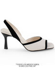 Vista lateral en zapatilla beige con negro para dama de talón descubierto, punta abierta y tacón medio 8cm