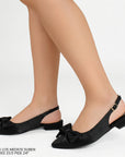 Flats negros para mujer con moño en punta fina destalonado con correa ajustable