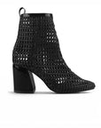 vista lateral de botas negras tejidas para dama con tacón medio 8cm