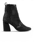 vista superior de botas negras tejidas con tacón medio 8cm