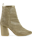 vista lateral de botas oro tejidas para dama con tacón medio 8cm