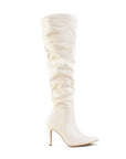 vista lateral de botas beige para dama con detalle plisado y tacón alto 11 cm