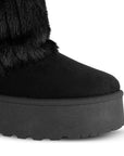 Vista de punta redonda en botín negro al tobillo para mujer con doblez de peluche y plataforma baja de 5cm de meter