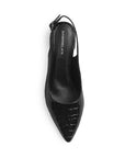 Vista superior de zapatilla negra destalonada para mujer con pulsera ajustable y punta cerrada fina