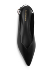 Vista superior de flats negro para dama con punta fina pulsera ajustable y detalles ondulados para dama