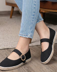 Alpargatas para mujer color negro con pulsera de piso.