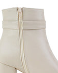 vista del detalle en la cremallera de las botas beige para dama con tacón 7cm