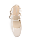 Vista superior de zapatilla con doble hebilla para mujer color beige
