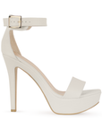 Vista lateral de zapatilla color beige para mujer con tacon alto