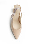 Vista superior zapatillas tipo stiletto color maquillaje para mujer