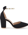 Vista lateral de zapatilla para mujer color negro con tacon medio y perlas