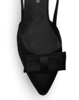 Vista de material shantung en zapatilla para mujer con moño color negro