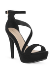 Vista diagonal de zapatilla para mujer color negro con tira cruzada