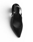Vista superior de zapatillas negras destalonada de tacón alto para mujer
