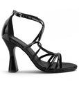 vista lateral de zapatillas negras con tacón para dama