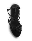 vista superior de las zapatillas negras para dama con detalle en tiras cruzadas