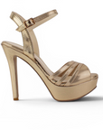 vista lateral de zapatillas oro de dama con plataforma y tacon alto