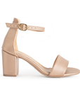 Vista lateral de zapatilla oro rosado para mujer con pulsera y tacón bajo
