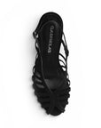 vista superior de zapatillas negras con tiras para mujer