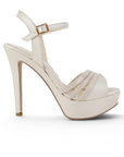 vista lateral de zapatillas beige de mujer con plataforma y tacon