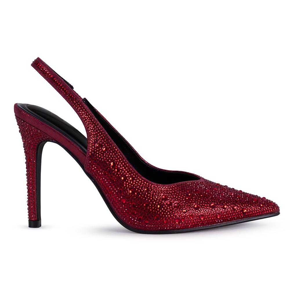 Vista lateral de la zapatilla roja tipo stiletto para dama con punta fina pedrería brillante y tacón medio 10cm 