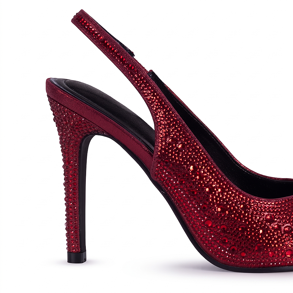 Vista trasera del tacón medio 10 cm delgado con pedrería brillante de la zapatilla roja tipo stiletto para dama 