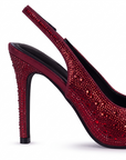 Vista trasera del tacón medio 10 cm delgado con pedrería brillante de la zapatilla roja tipo stiletto para dama 