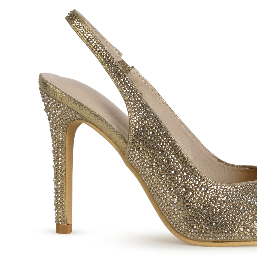 Vista trasera del tacón medio 10 cm delgado con pedrería brillante de la zapatilla dorada tipo stiletto para dama 