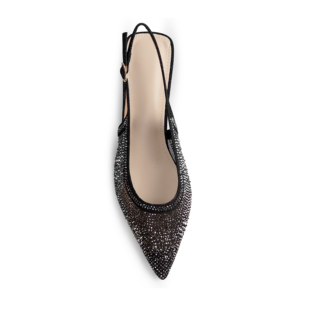 Vista superior de la zapatilla negra para fiesta con punta fina pedrería y pulsera ajustable al talón 