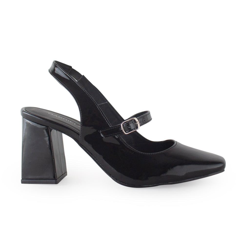 vista lateral de zapatillas negras de charol con correa ajustable y tacón medio 8cm para dama 