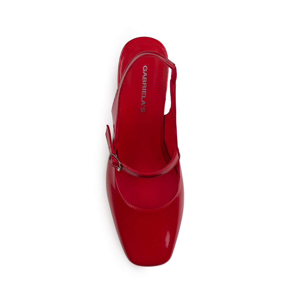 vista superior de zapatillas rojas de charol para dama destalonadas con tacón medio 8cm 