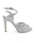 Vista lateral de zapatilla plata para mujer con tacón delgado alto de 11cm y pulsera ajustable al tobillo 