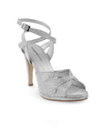 Vista diagonal de zapatilla plata para mujer con pulseras ajustables al tobillo y tacón alto de 11cm