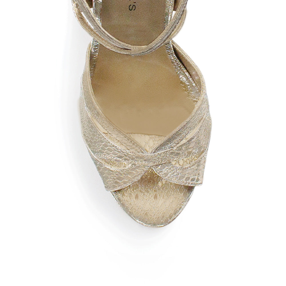 Vista de material sintético en zapatilla oro para mujer con tacón alto de 11cm y pulsera ajustable al tobillo