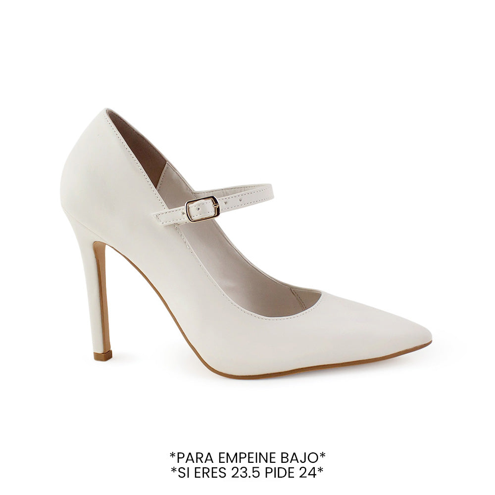 Vista lateral de zapatilla beige para mujer con pulsera y tipo stiletto de tacón 10cm