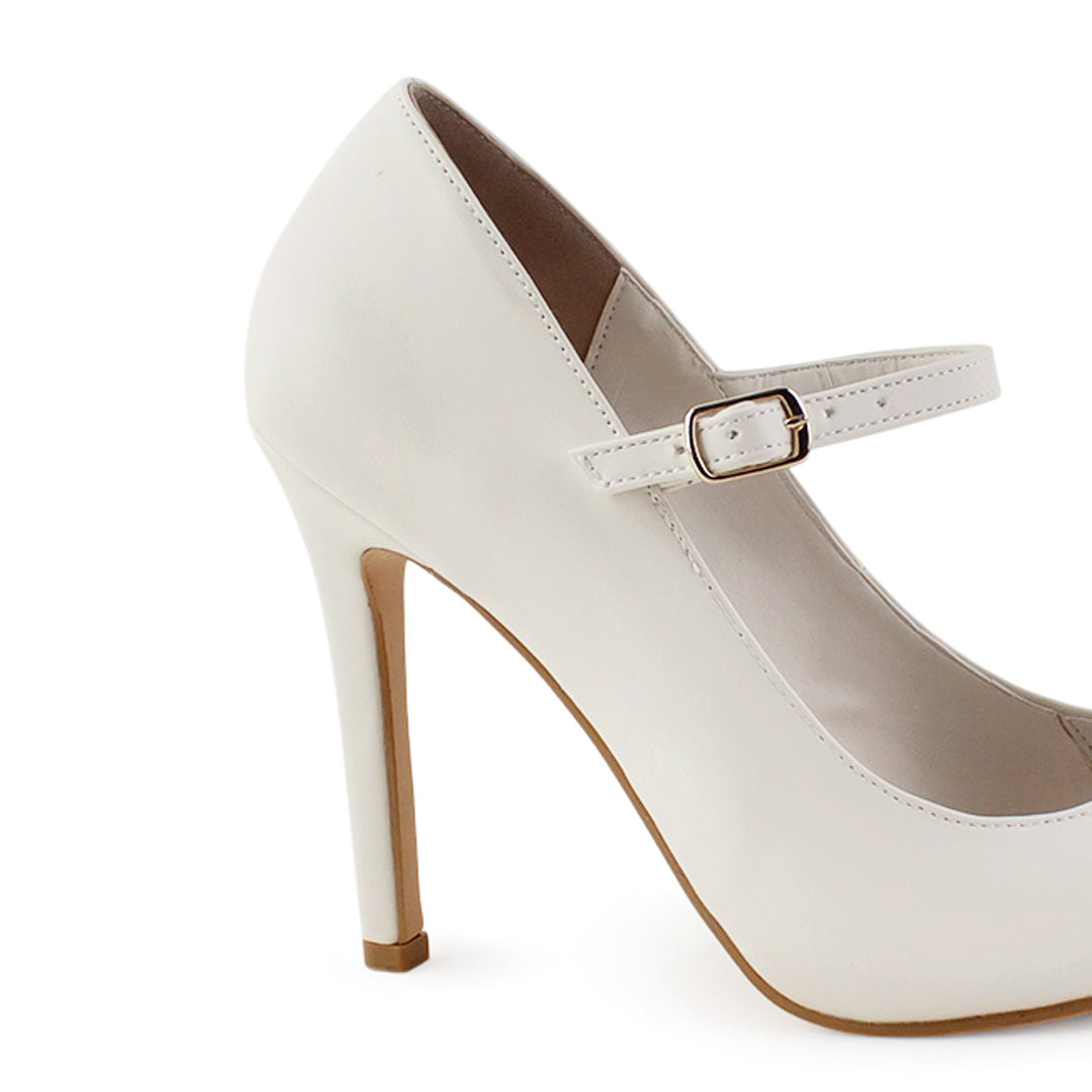 Vista trasera de tacón delgado de 10cm en zapatilla beige para mujer tipo stiletto