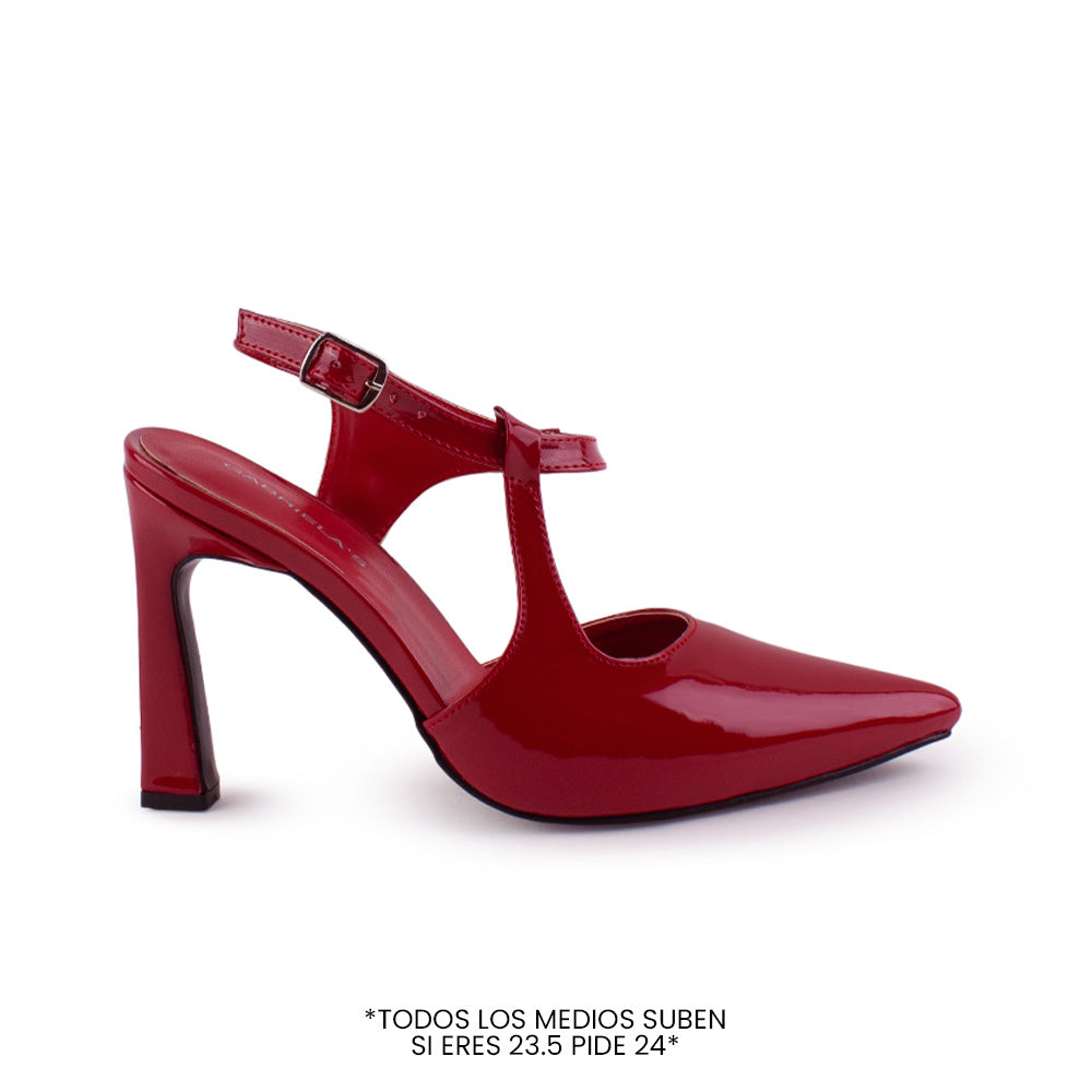 vista lateral de zapatillas rojas punta fina destalonadas con tacón medio 10 cm y correa ajustable para dama 