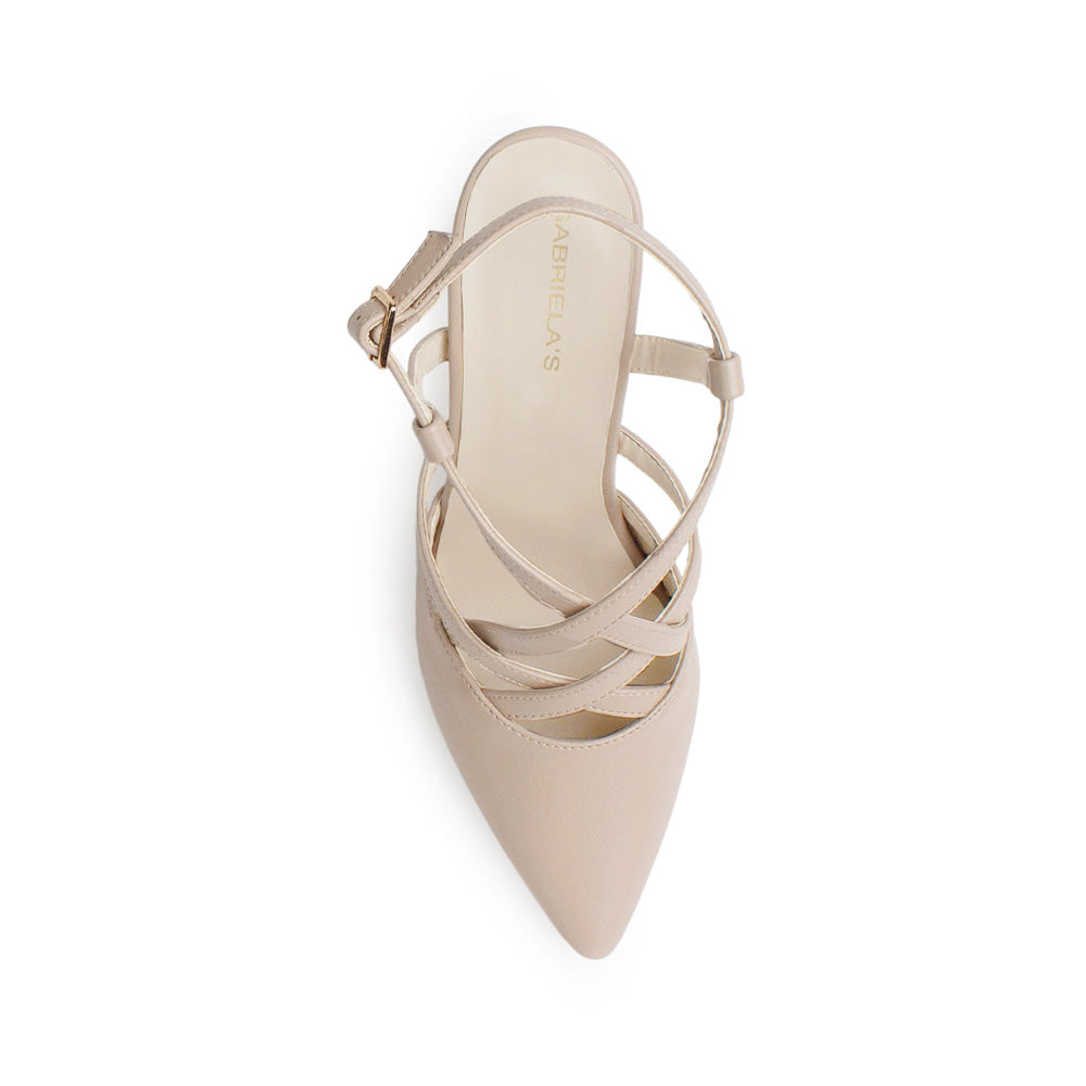 Vista superior de la zapatilla nude tipo stiletto con tacón medio 10 cm y tiras cruzadas al frente para dama 
